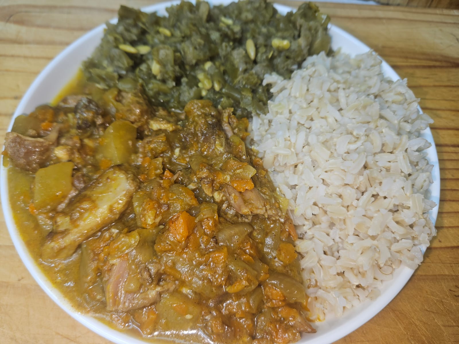 Pork neck curry with rice and greens
